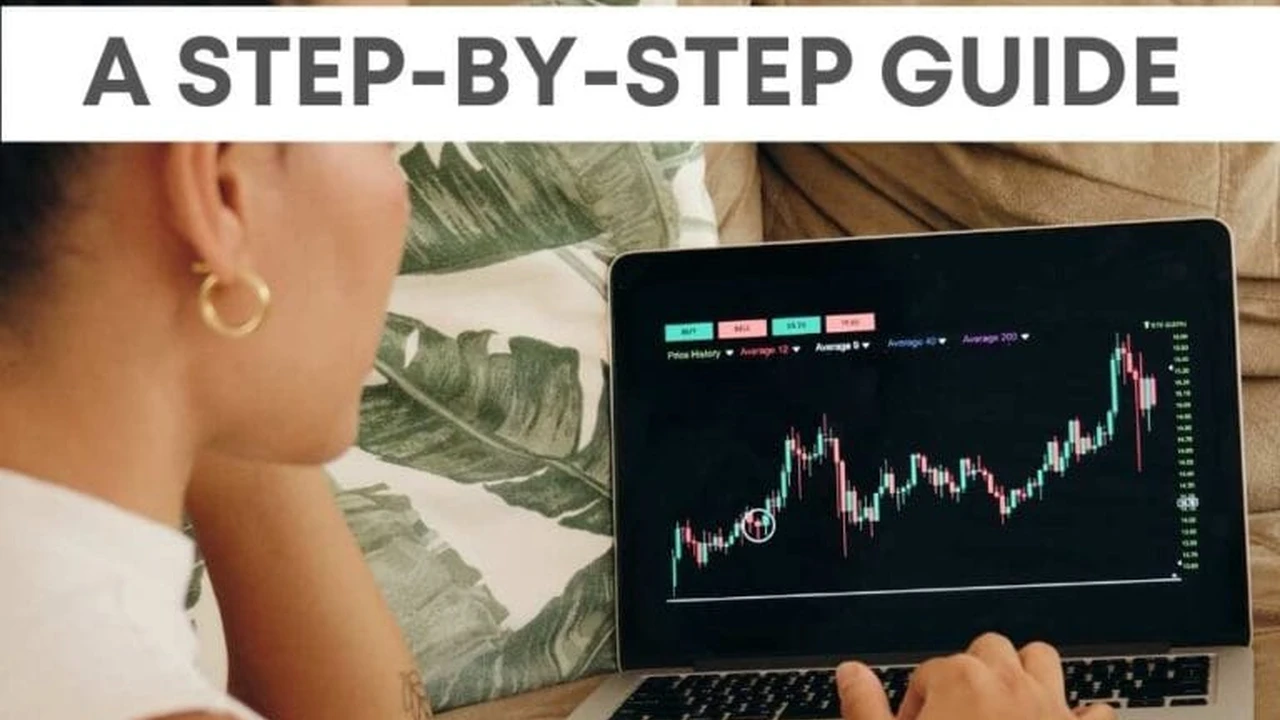 Close up on a plate of mashed potatoes, topped with baked pork chops with cream of mushroom soup, and a side of green beans.