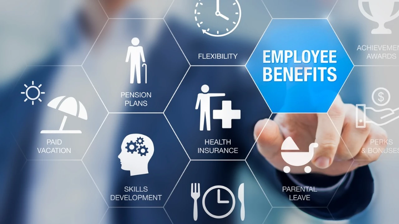 Close up on a plate of mashed potatoes, topped with baked pork chops with cream of mushroom soup, and a side of green beans.