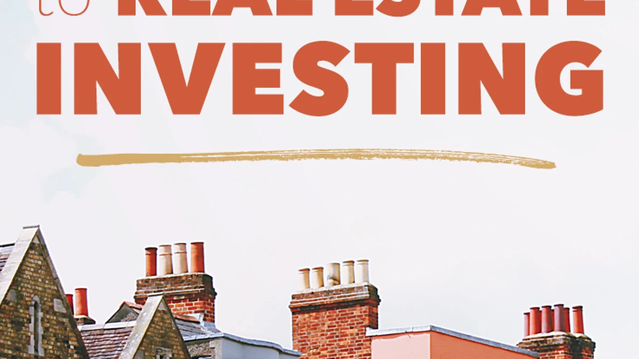 Close up on a plate of mashed potatoes, topped with baked pork chops with cream of mushroom soup, and a side of green beans.